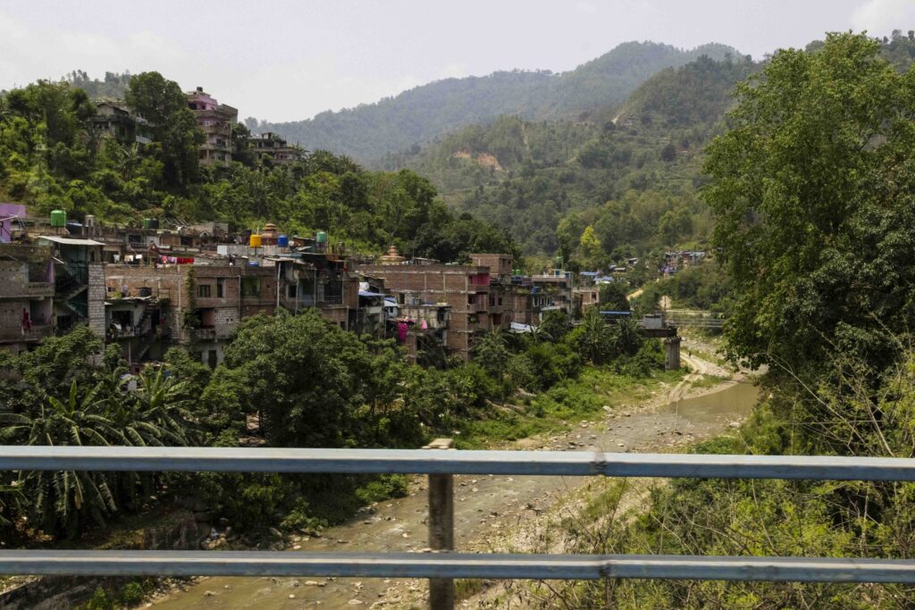 Communities on the far side of the river are accessed through long suspension bridges.