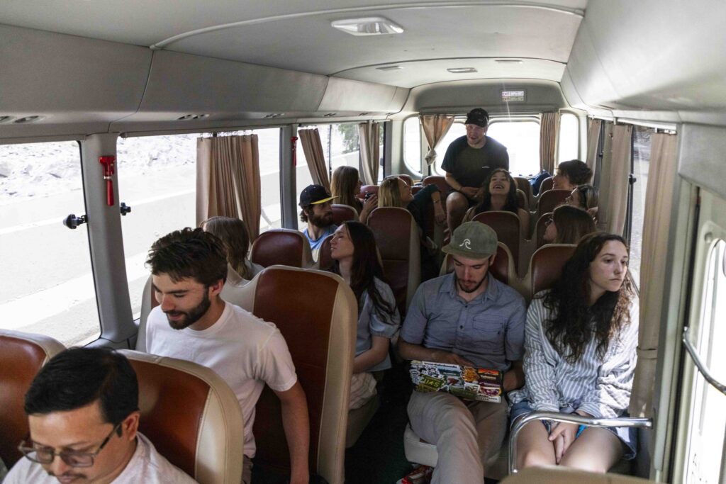 People prone to getting car sick sit nearer to the large front windshield of our bus on May 16, 2026.