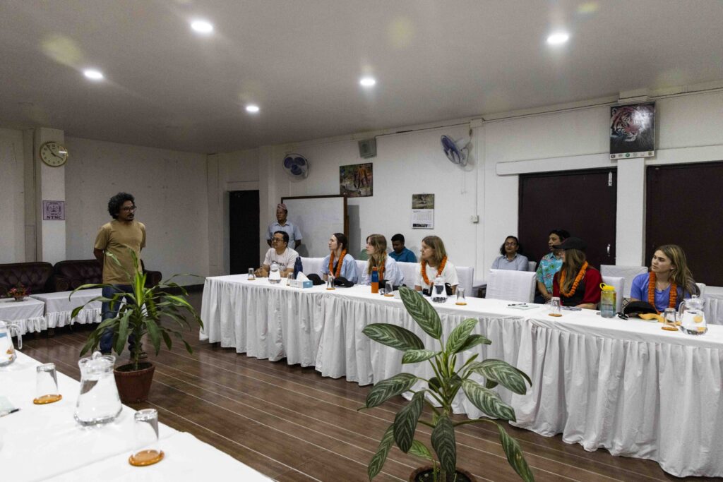 Program leaders introduce the group to safety precautions on May 16, 2026. For guests staying in the field-work dorms precautions include staying close to the dorms after nightfall. We are not allowed to walk around the area alone, especially at dawn and dusk.